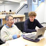 North Yarmouth Academy Photo #2 - NYA student with his advisor and English teacher in the Bicentennial Learning Commons