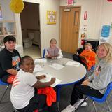 North Yarmouth Academy Photo #26 - NYA Upper School students with with the fourth graders on their math lessons.